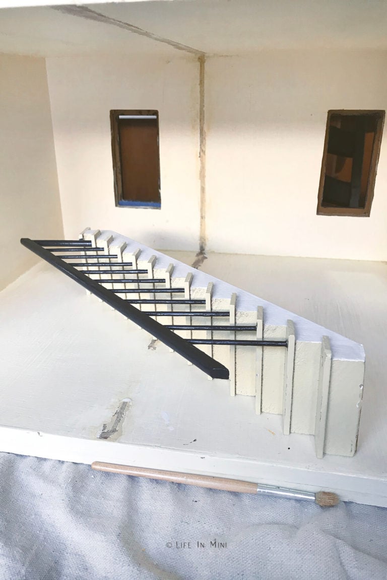 Repainting dollhouse stairs with with black railings