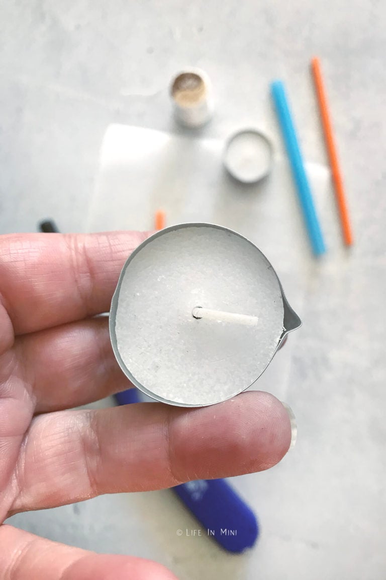 Make a spout out of metal part of tea light