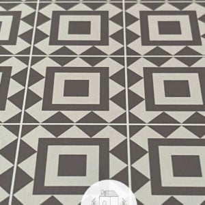 Closeup of 1:6 taupe square geometric dollhouse tile flooring