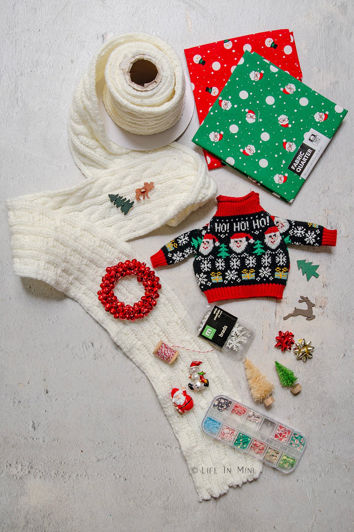 Assorted Christmas themed miniatures from ribbons, fabrics and other notions.