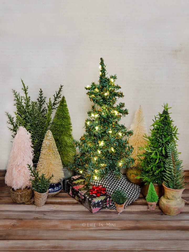 Several different kinds of dollhouse Christmas trees.
